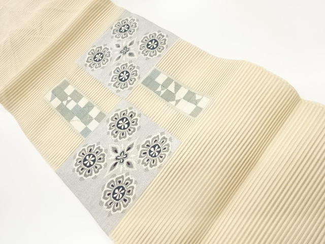 絽綴れ色紙に華文・幾何学模様織出し名古屋帯